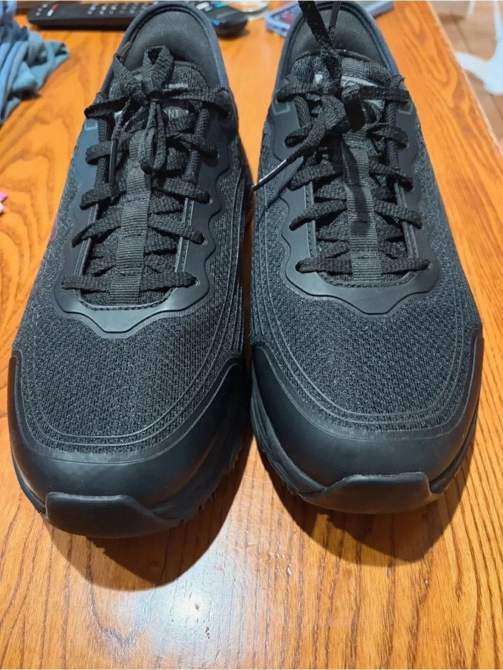 Skechers Men’s Black Athletic Sneakers with Red Insole Accent